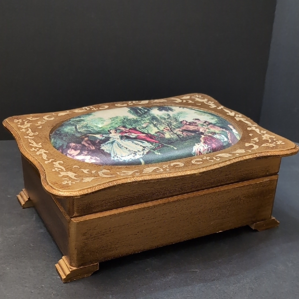 VGT, Florentine Wooden Jewelry Box with Gold Tone Finish And A Dancing Scene.